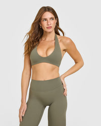 SoftMotion™ Minimal Halter Neck Bralette with White Logo | Alpine Green
