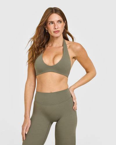 SoftMotion™ Minimal Halter Neck Bralette with White Logo | Alpine Green