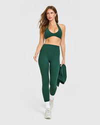 SoftMotion™ Minimal Halter Neck Bralette with White Logo | Dark Racing Green