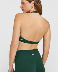 SoftMotion™ Minimal Halter Neck Bralette with White Logo | Dark Racing Green