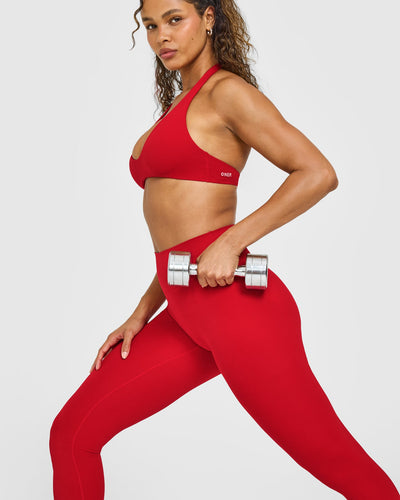 SoftMotion™ Minimal Halter Neck Bralette with White Logo | Light Toasted Red