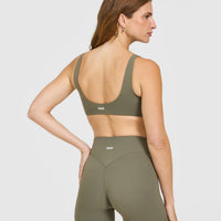 SoftMotion™ Scoop Back Bralette with White Logo | Alpine Green