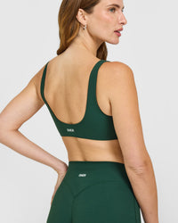 SoftMotion™ Scoop Back Bralette with White Logo | Dark Racing Green