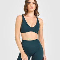 SoftMotion™ Scoop Back Bralette with White Logo | Oil Blue