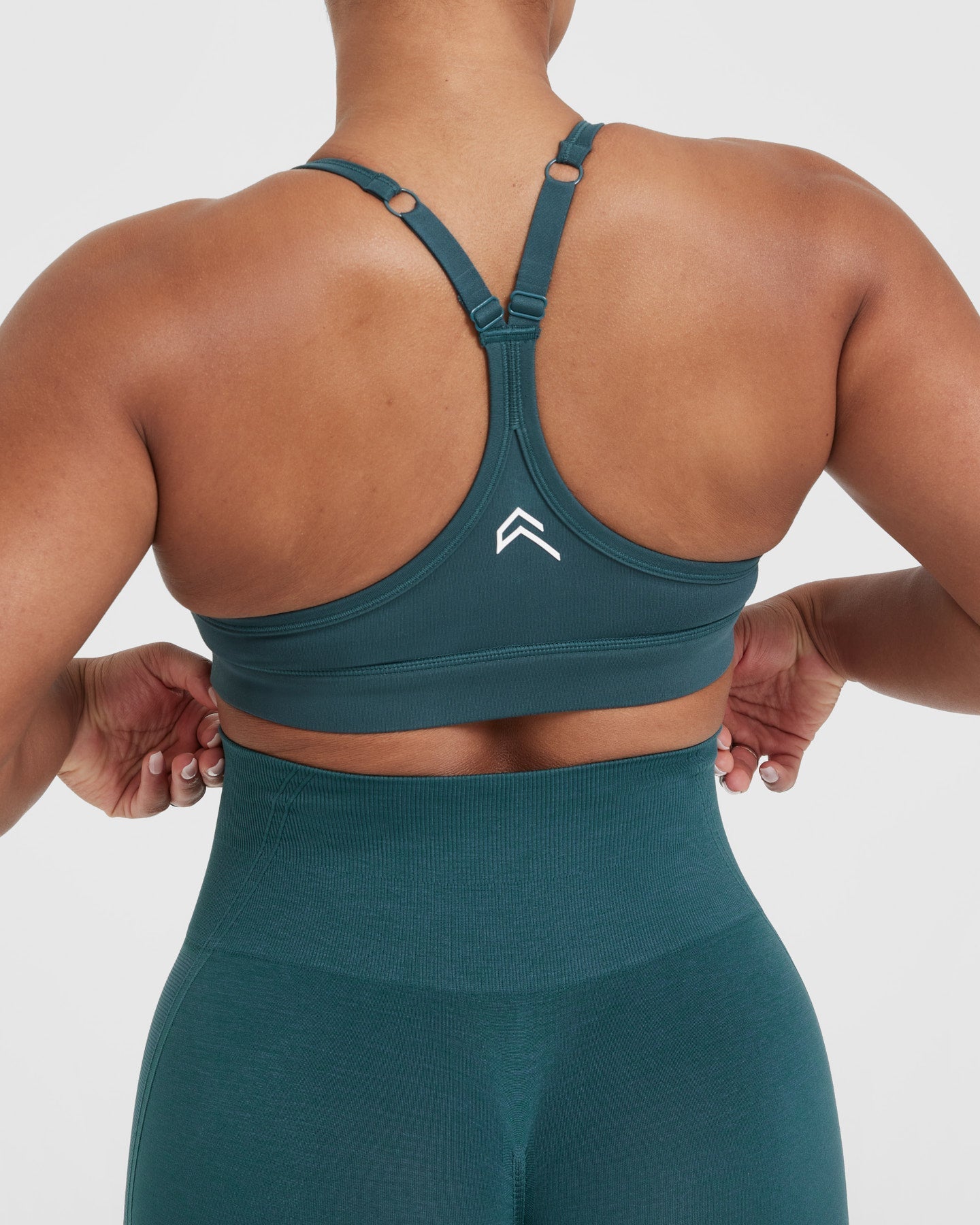 Teal best sale sports bra